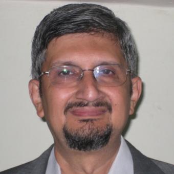 Dr. S V Kamat